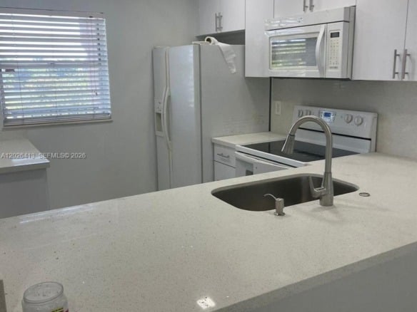 9460 Tangerine Pl # 404, Davie FL 33324 — #A12026413