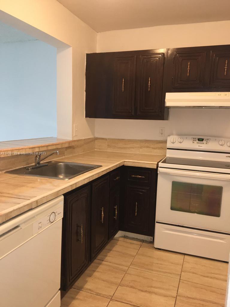 f3b61b38-2563 498 NW 165th St Rd # D205, Miami FL 33169 — #A11439799