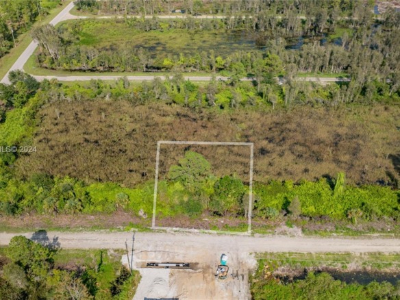 853 Belden Ave, Lehigh Acres FL 33936 — #A11494363