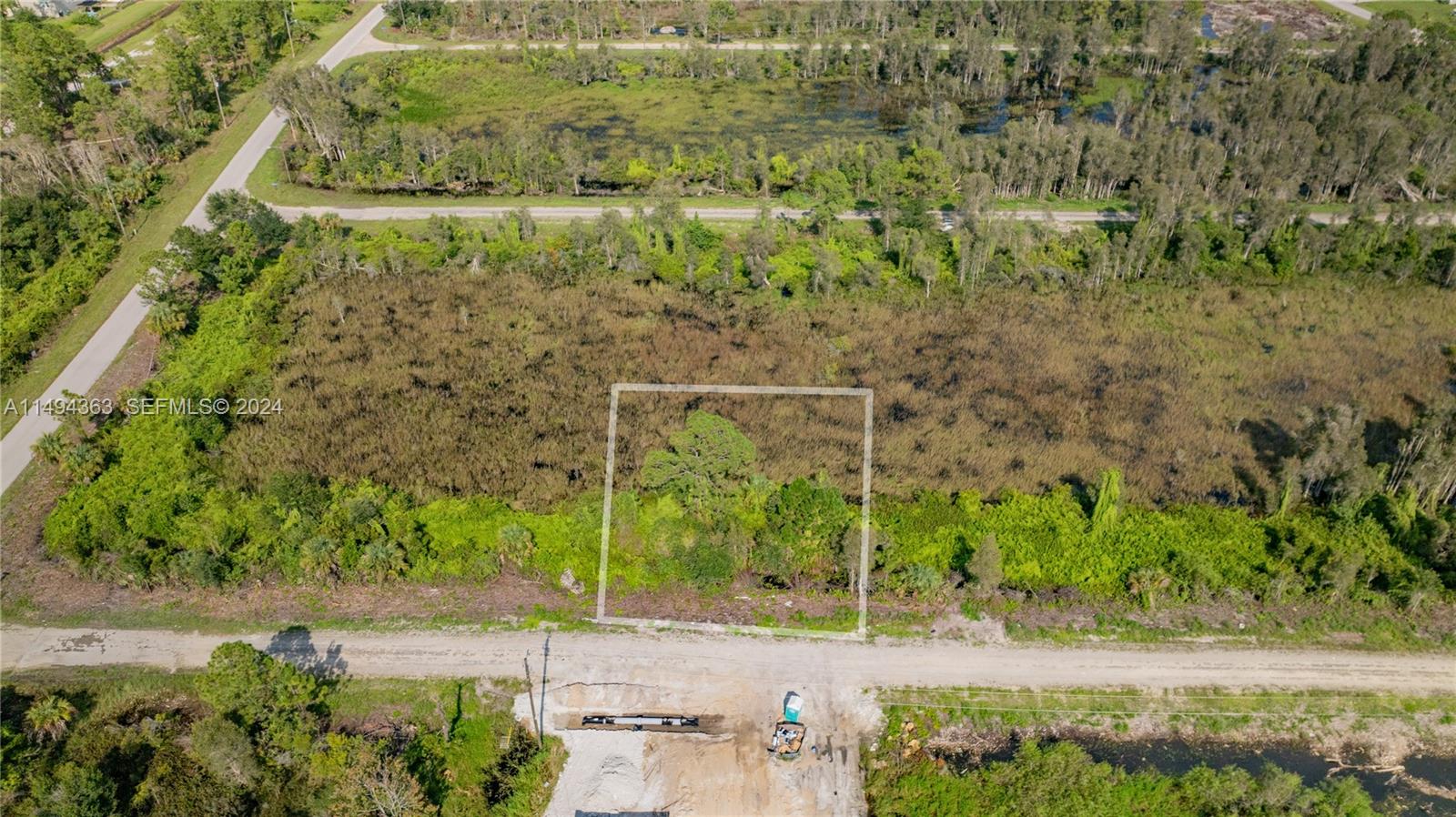 853 Belden Ave, Lehigh Acres FL 33936 — #A11494363