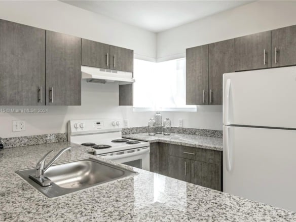243 W 77th St # 102, Hialeah FL 33014 — #A11617615