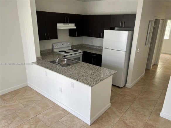 7945 W 2nd Ct # 102, Hialeah FL 33014 — #A11617653