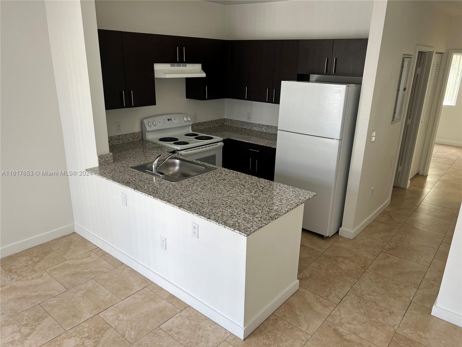 7945 W 2nd Ct # 102, Hialeah FL 33014 — #A11617653