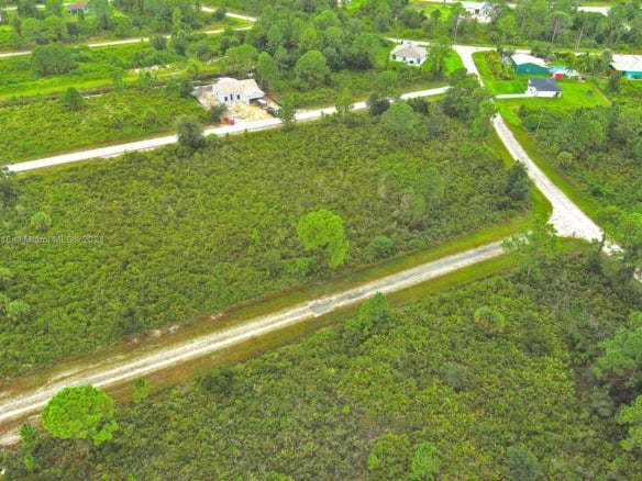 642 Vasser Ave S, Lehigh Acres FL 33974 — #A11659918