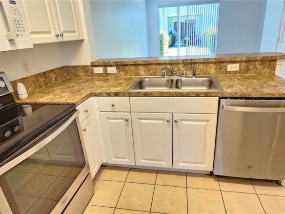 1935 Gardenia Ct # 1935, Riviera Beach FL 33404 — #A11669376