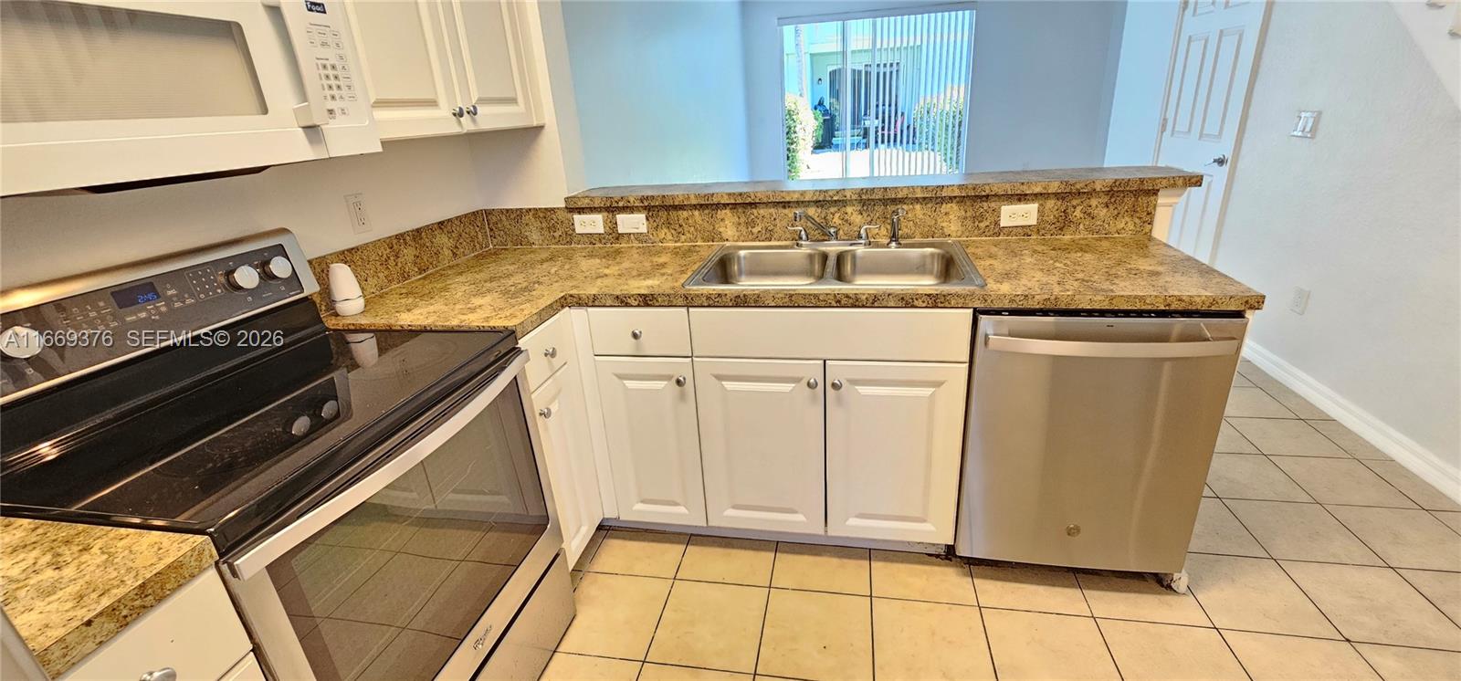 f3b61b38-3361 1935 Gardenia Ct # 1935, Riviera Beach FL 33404 — #A11669376