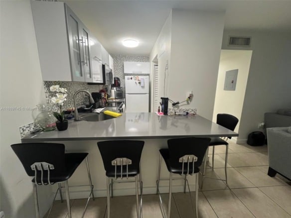 8075 NW 7th St # 109, Miami FL 33126 — #A11669745