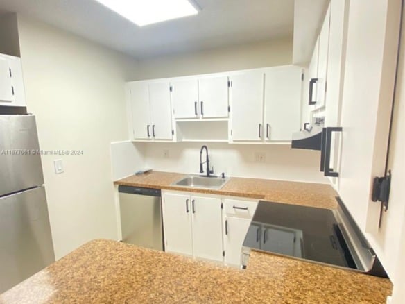 2029 NW 46th Ave # E308, Lauderhill FL 33313 — #A11677661