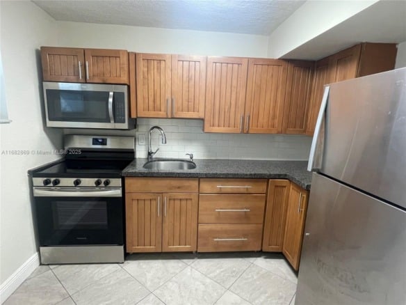 4255 N University Dr # 201, Sunrise FL 33351 — #A11682869