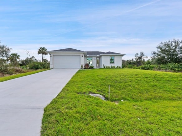 957 COMMODORE ST, Lehigh Acres FL 33974 — #A11715235