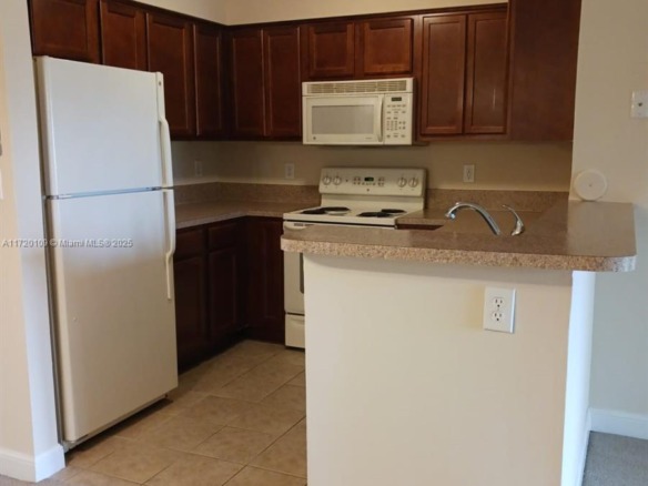 7630 Westwood Dr # 305, Tamarac FL 33321 — #A11720109