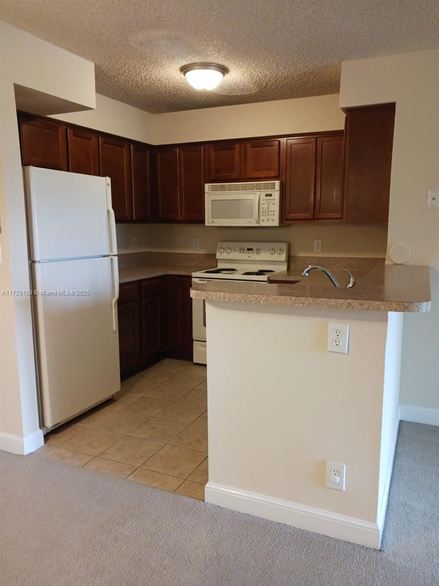 7630 Westwood Dr # 305, Tamarac FL 33321 — #A11720109
