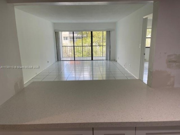 301 Racquet Club Rd # 201, Weston FL 33326 — #A11720113