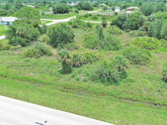 841 Milwaukee Blvd, Lehigh Acres FL 33974 — #A11842386