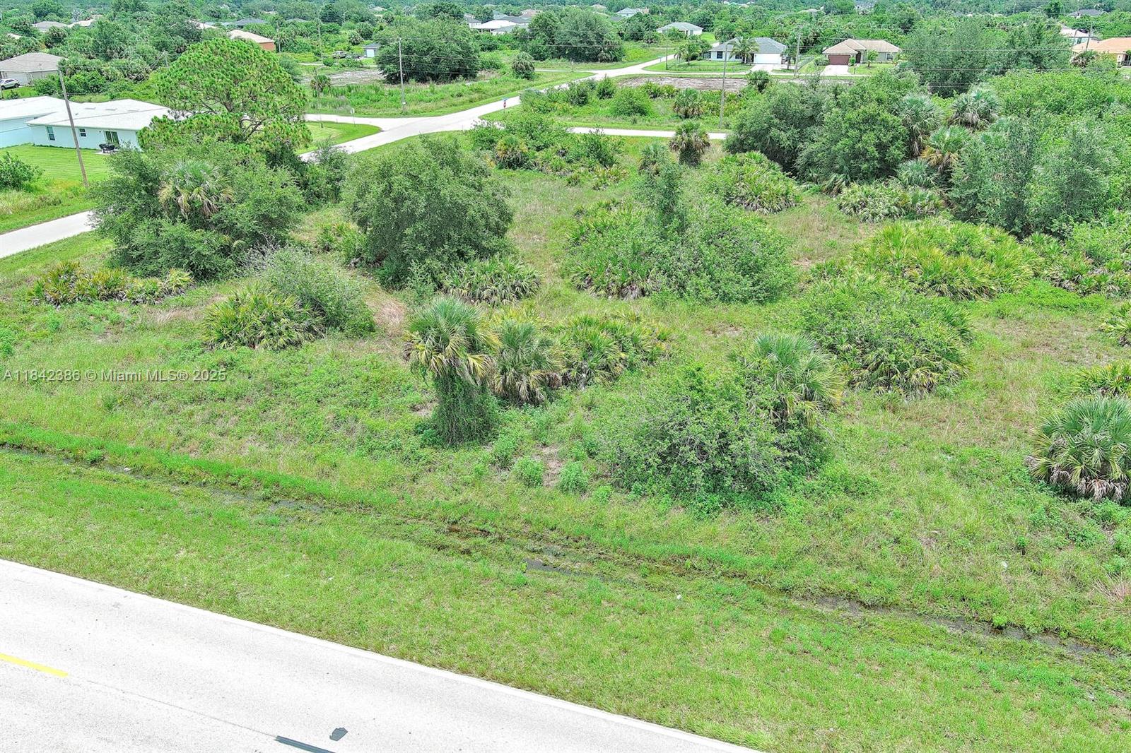 841 Milwaukee Blvd, Lehigh Acres FL 33974 — #A11842386