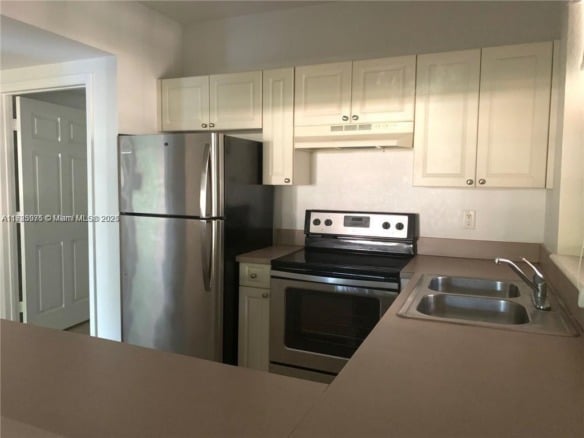 6776 W Sample Rd # 6776, Coral Springs FL 33067 — #A11723975