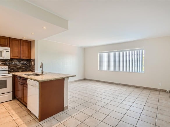 1855 Plunkett St # 406, Hollywood FL 33020 — #A11760125