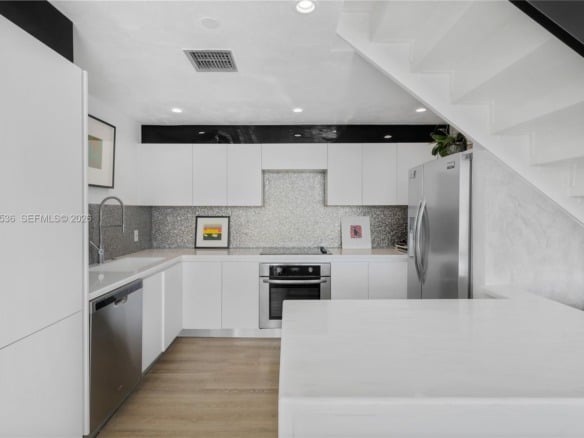 1000 Venetian Way # 810, Miami FL 33139 — #A11762536
