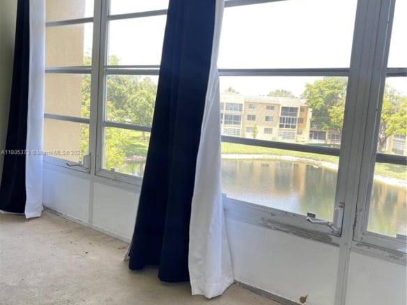 6071 NW 61st Ave # 311, Tamarac FL 33319 — #A11805373