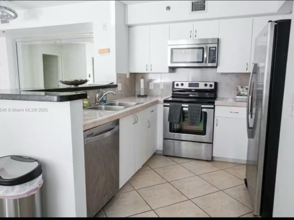 19601 E Country Club Drive # 203, Aventura FL 33180 — #A11815540