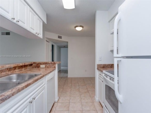 1235 SW 46th Ave # 707, Pompano Beach FL 33069 — #A11818090