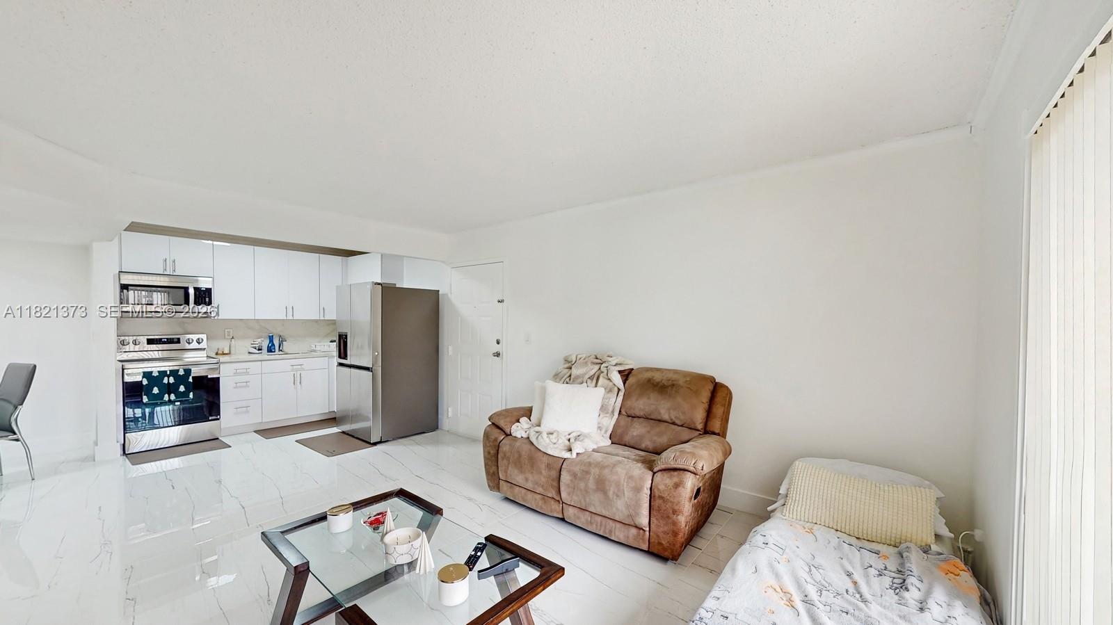 f3b61b38-5490 7180 NW 179th St # 105, Hialeah FL 33015 — #A11821373