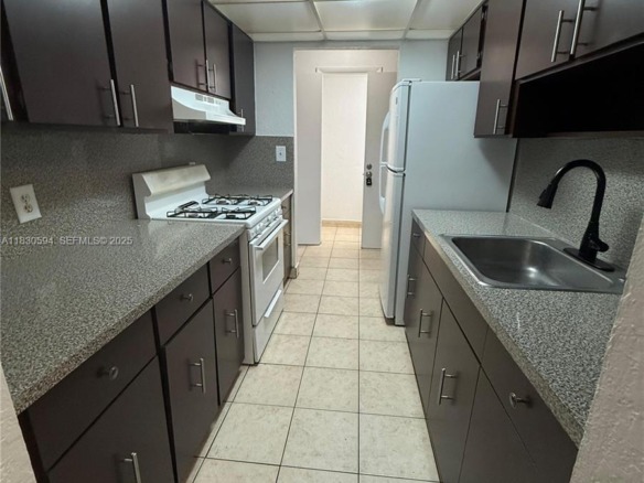 1305 W 53rd St # 406, Hialeah FL 33012 — #A11830594