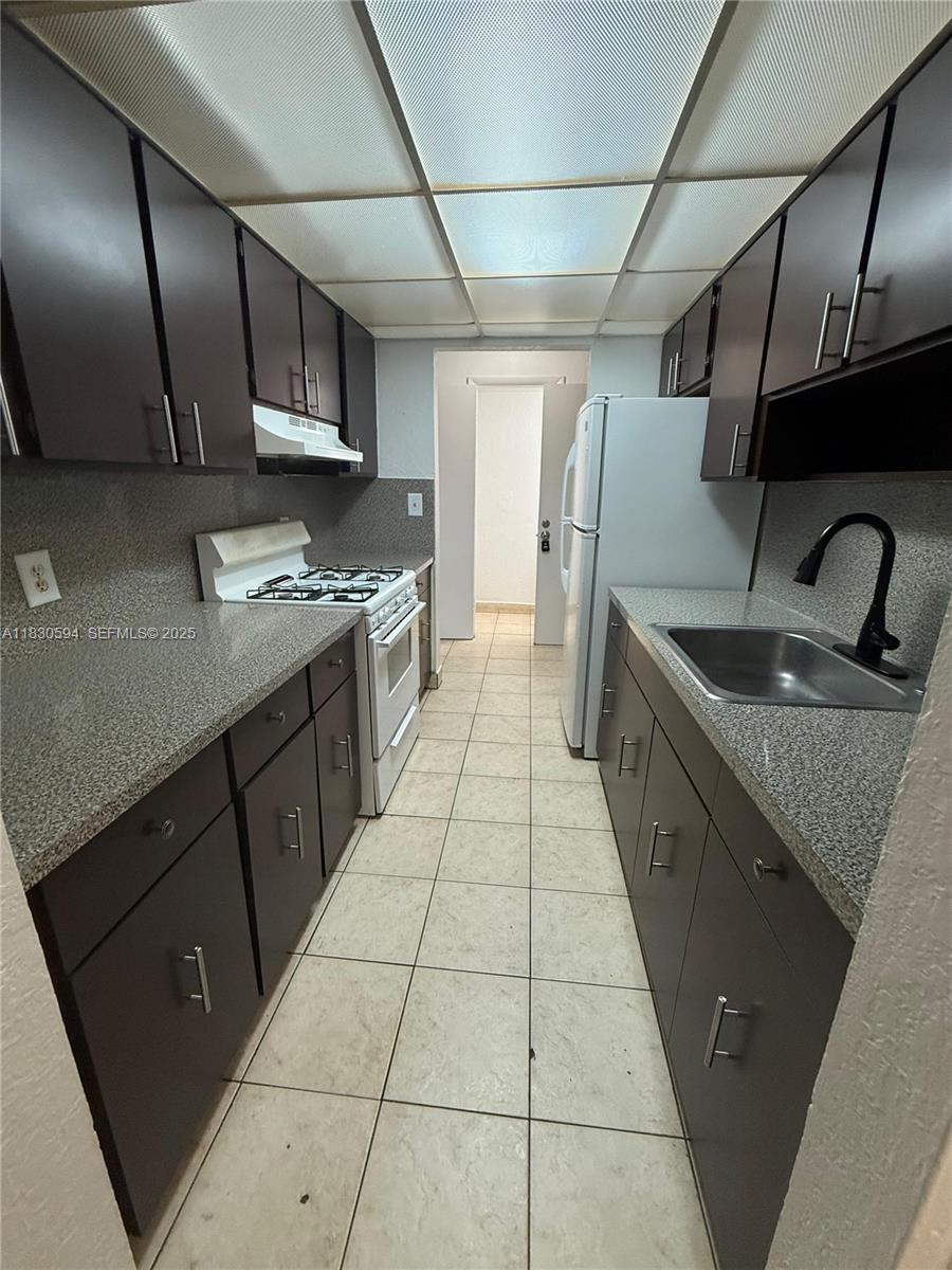 f3b61b38-5720 1305 W 53rd St # 406, Hialeah FL 33012 — #A11830594