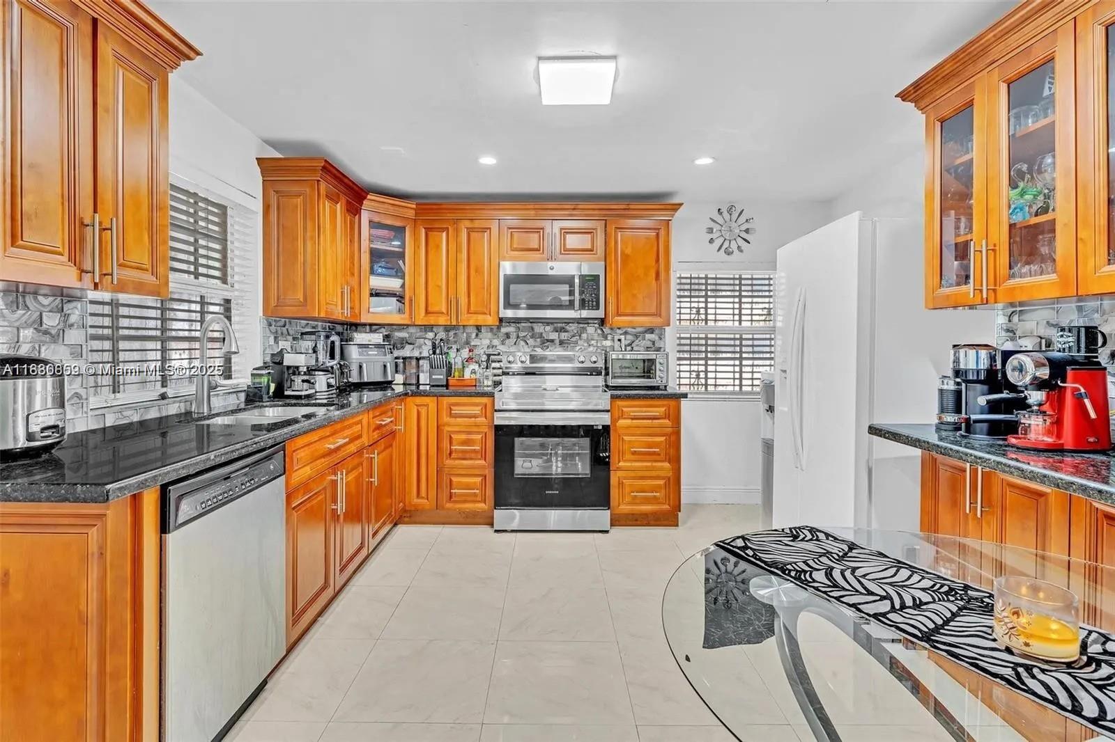 J 12840 NW 22nd Ave, Miami FL 33167 — #A11830859