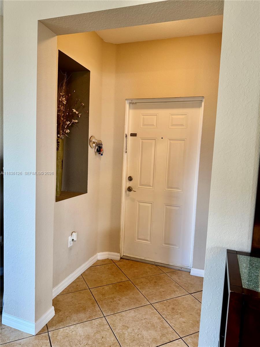 f3b61b38-5931 8800 NW 107th Ct # 202, Doral FL 33178 — #A11838126
