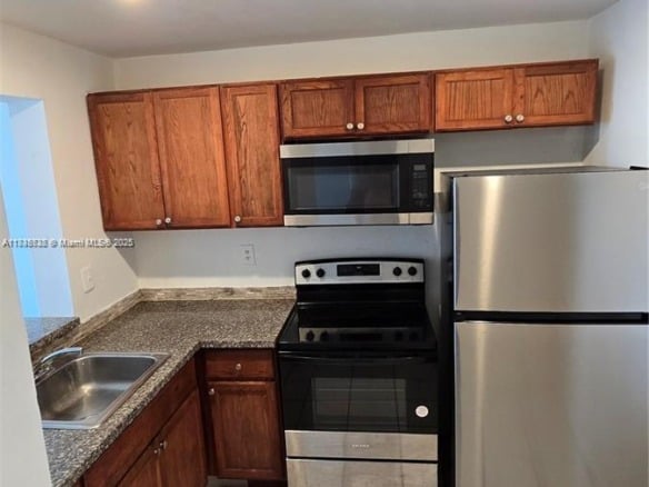 498 NW 165th St Rd # 407, Miami FL 33169 — #A11838732