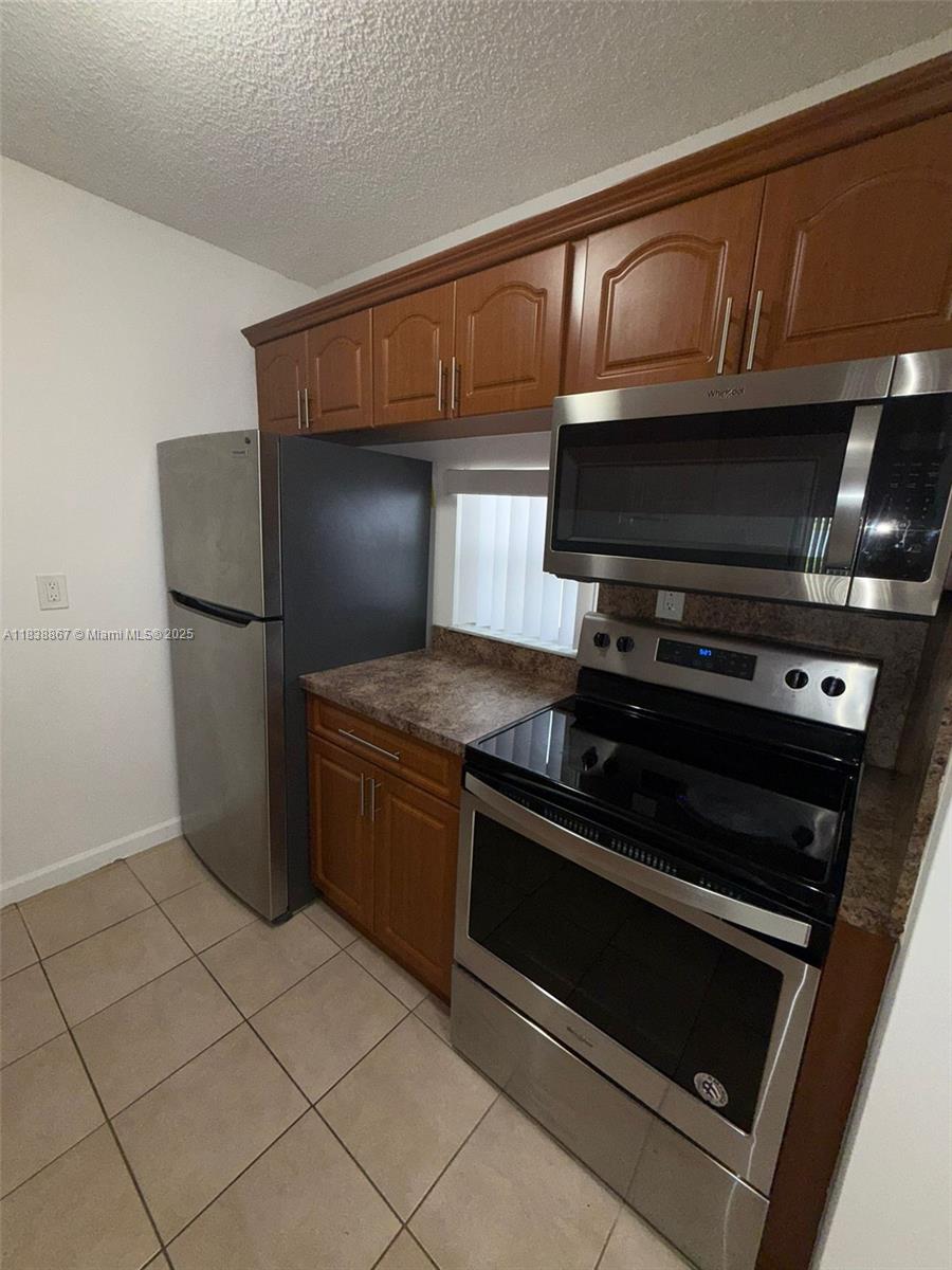 f3b61b38-5952 8560 N Sherman Cir # 105, Miramar FL 33025 — #A11838867