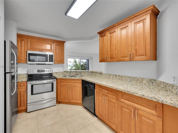 3453 NW 44th St # 107, Oakland Park FL 33309 — #A11846332