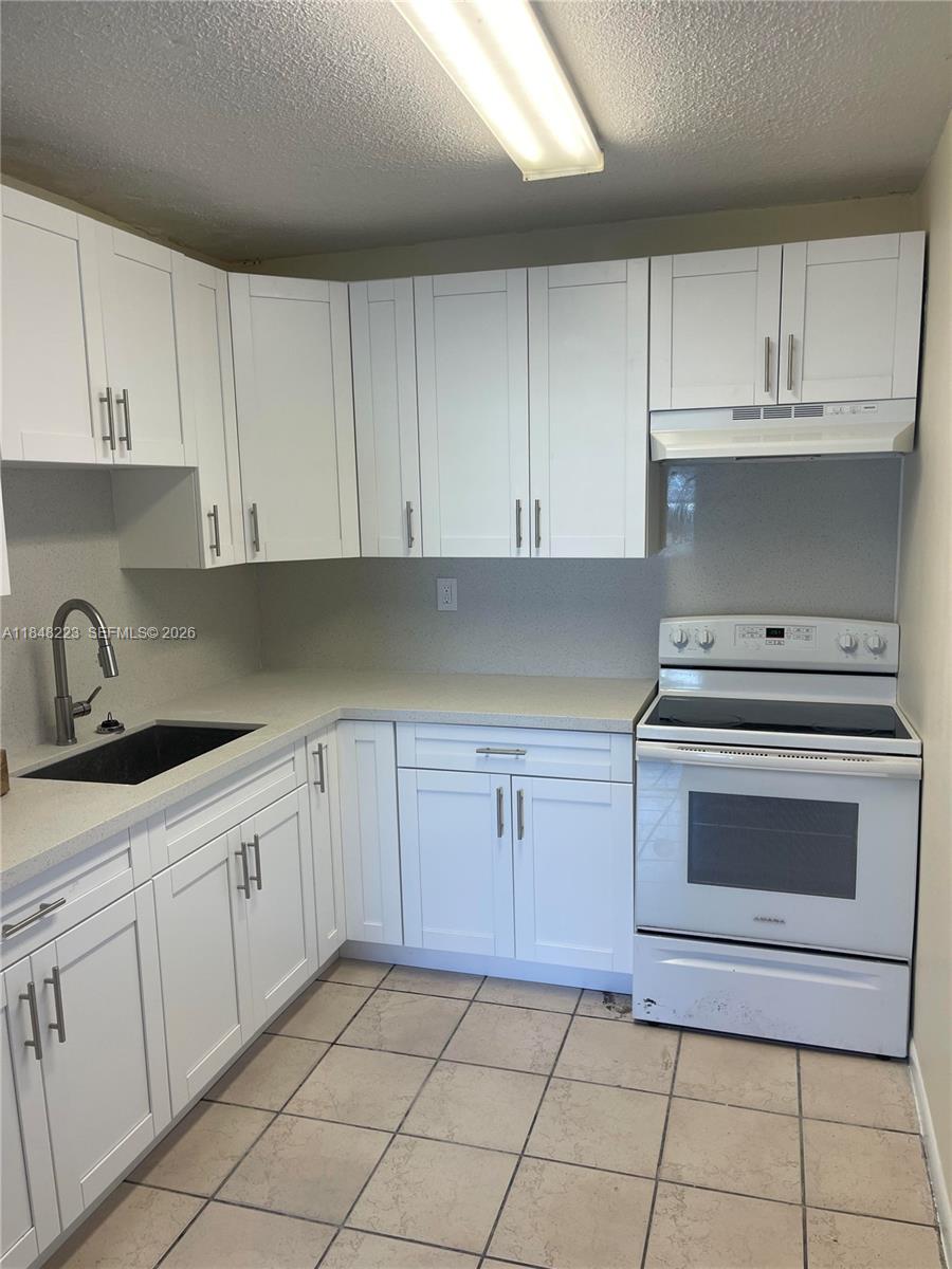 1325 W 68th St # 221, Hialeah FL 33014 — #A11848223