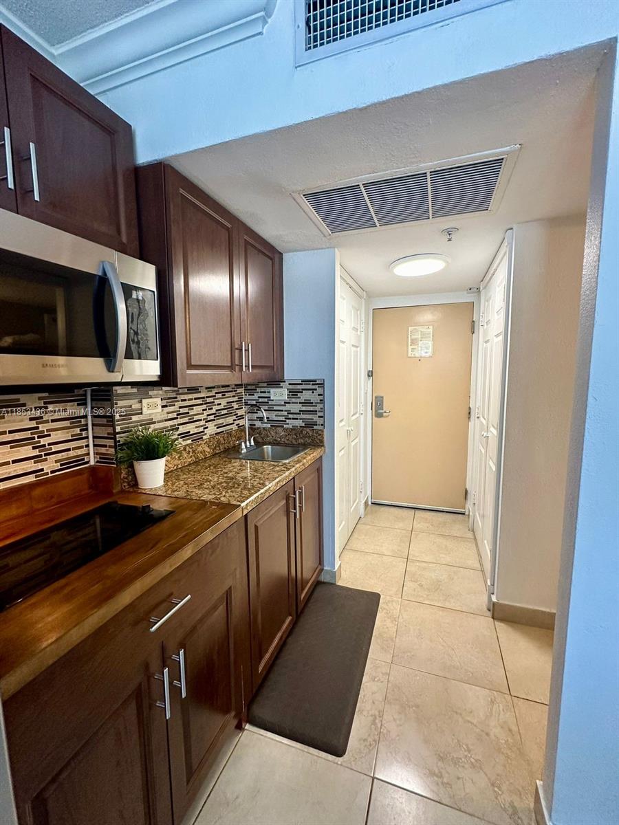f3b61b38-6459 19201 Collins Ave # 108, Sunny Isles Beach FL 33160 — #A11853436