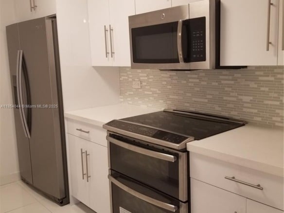 2651 NE 212th Ter # 103, Miami FL 33180 — #A11854044