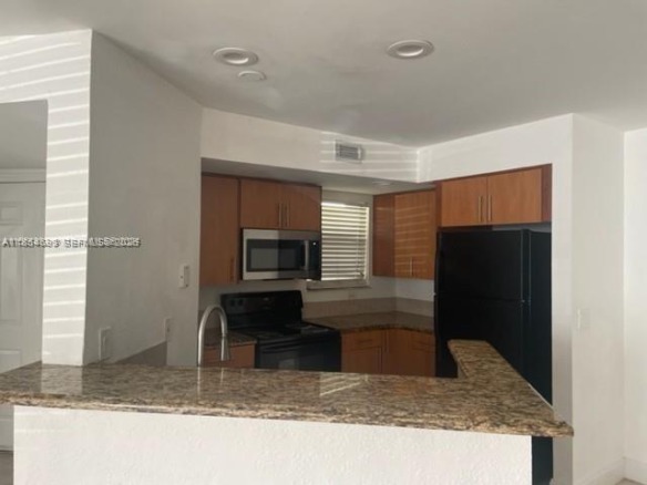 12950 Vista Isles Dr # 411, Sunrise FL 33325 — #A11854693