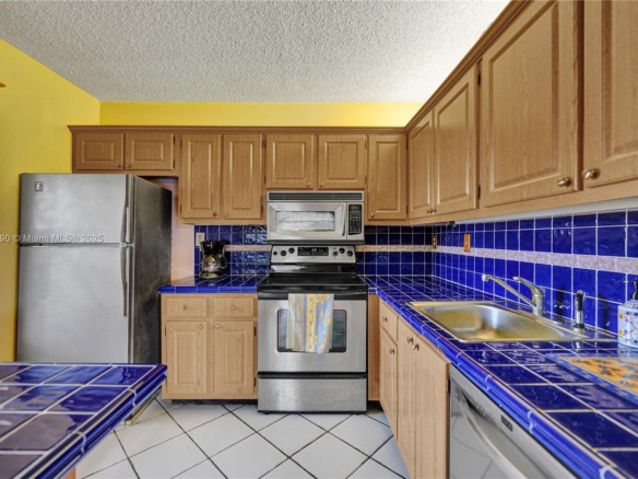 1104 N Hiatus Rd # 1104, Pembroke Pines FL 33026 — #A11698190