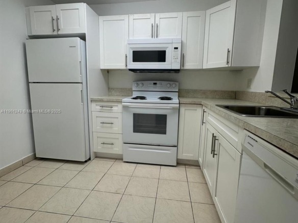 18101 NW 68th Ave # E210, Hialeah FL 33015 — #A11901243