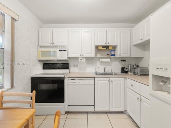1040 Country Club Dr # 309, Margate FL 33063 — #A11855840