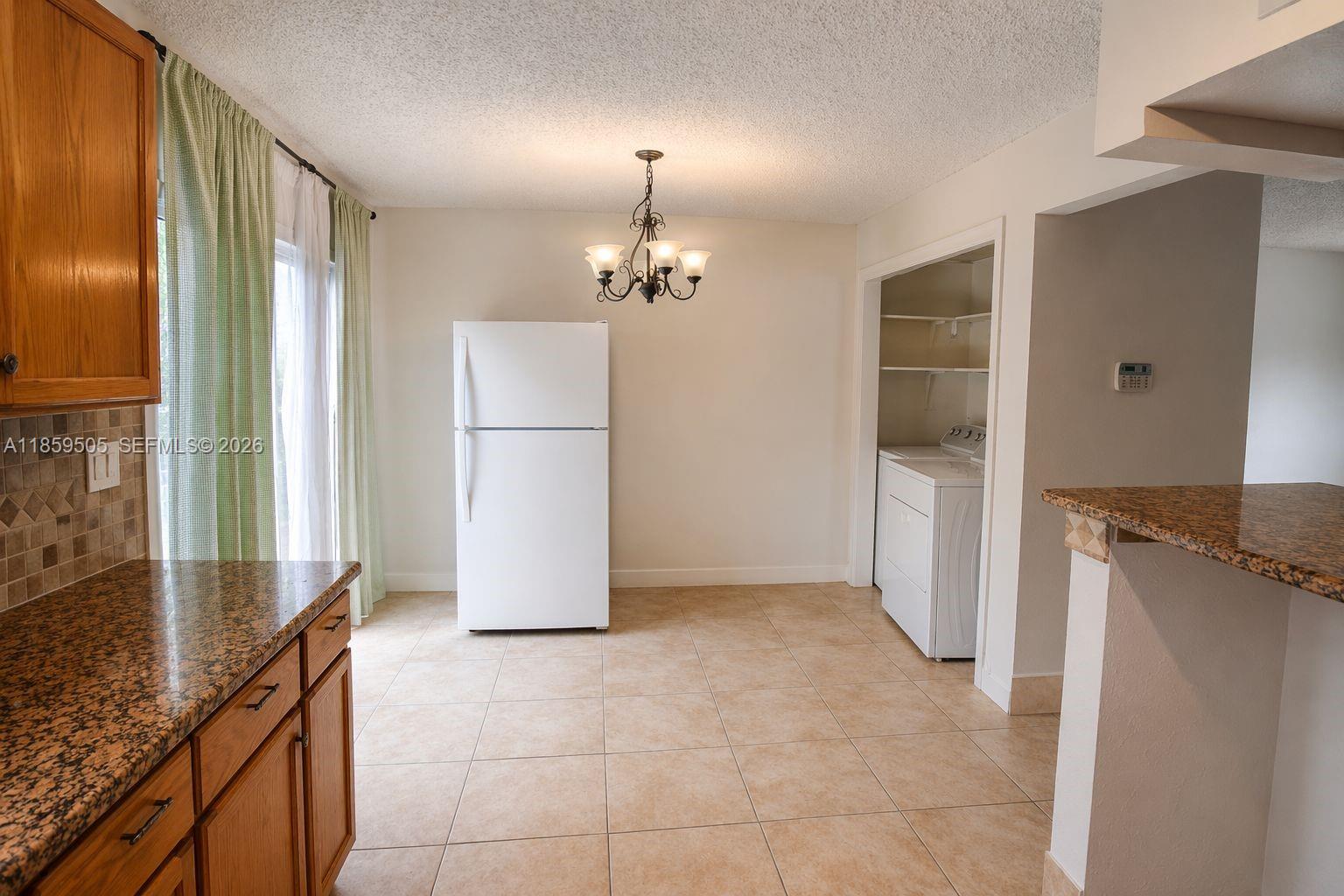 7501 Kimberly Blvd # 104, North Lauderdale FL 33068 — #A11859505