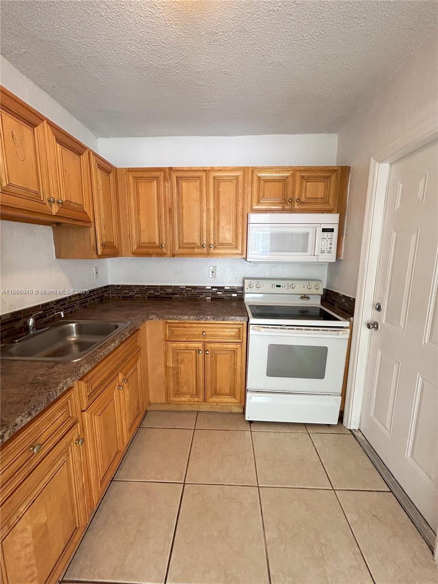 8287 NE Miami Ct # 101, Miami FL 33138 — #A11866940