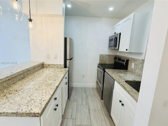 13101 Memorial Hwy # 104, North Miami FL 33161 — #A11870580