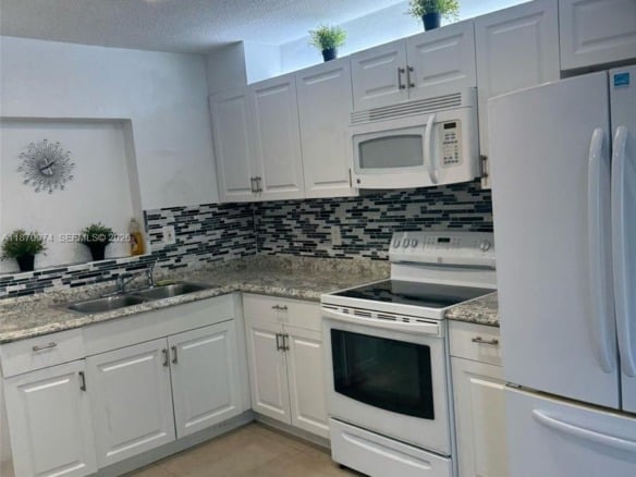 4808 NW 27th Ter, Tamarac FL 33309 — #A11870974
