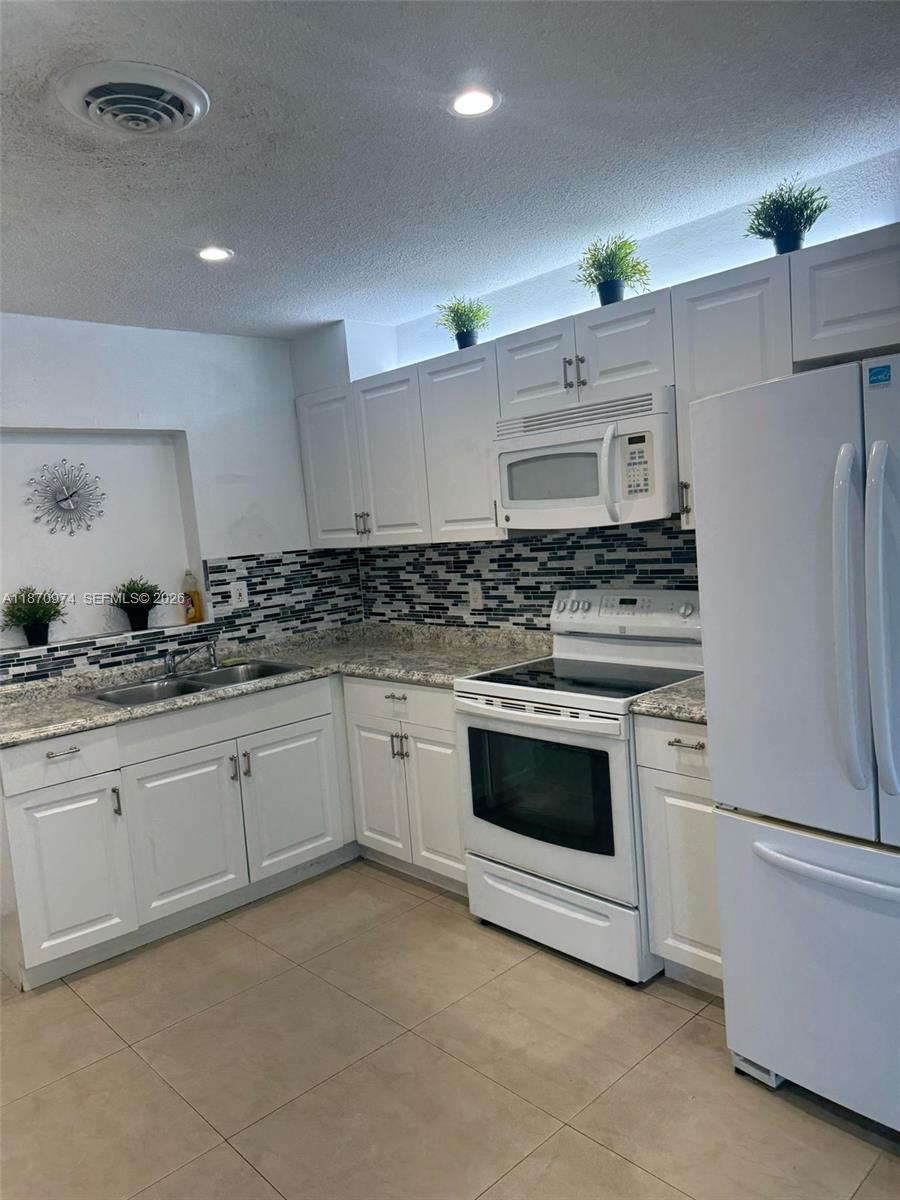 4808 NW 27th Ter, Tamarac FL 33309 — #A11870974