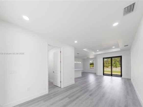 821 Newell St E, Lehigh Acres FL 33974 — #A11871339