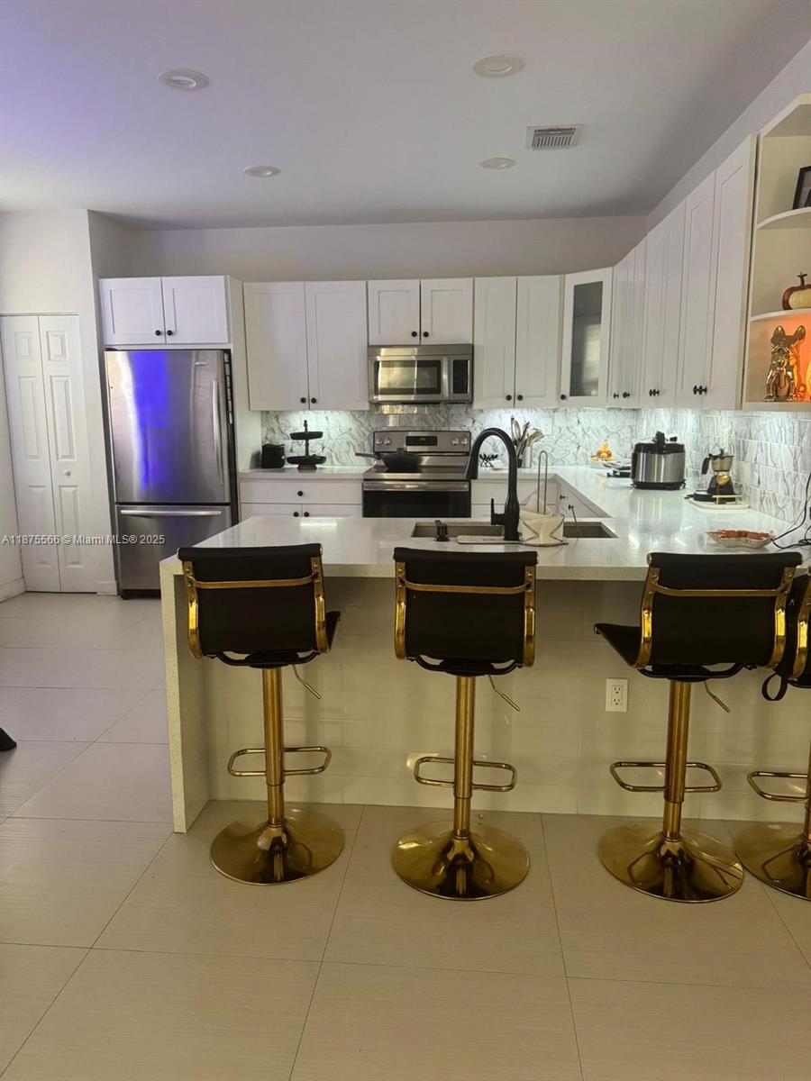 f3b61b38-7432 7414 NW 107th Ct, Doral FL 33178 — #A11875566