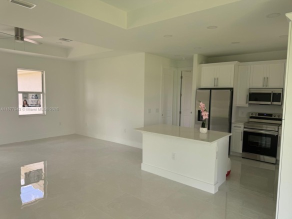 2044 Crawford Ave N, Lehigh Acres FL 33971 — #A11877943