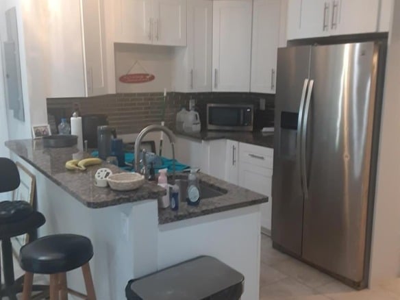 799 NE 34th Court, Oakland Park FL 33334 — #F10410152