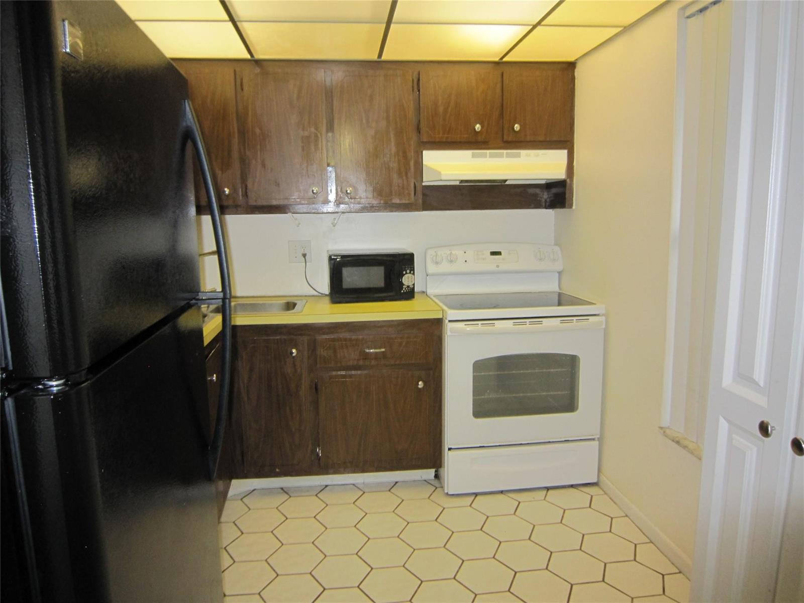 CREATOR: gd-jpeg v1.0 (using IJG JPEG v62), quality = 90 6150 NW 62nd Street # 107, Fort Lauderdale FL 33319 — #F10464279